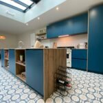 free-photo-of-spacious-kitchen-with-blue-furniture